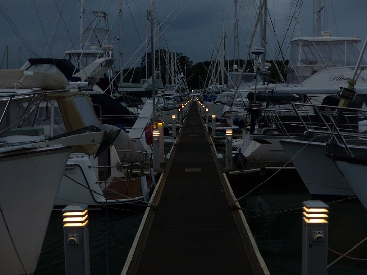 Like runway lights down the long dock at Gulf Harbour Marina